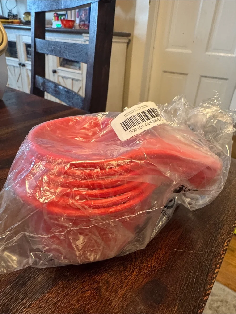 Red Tupperware measuring cups and spoons new